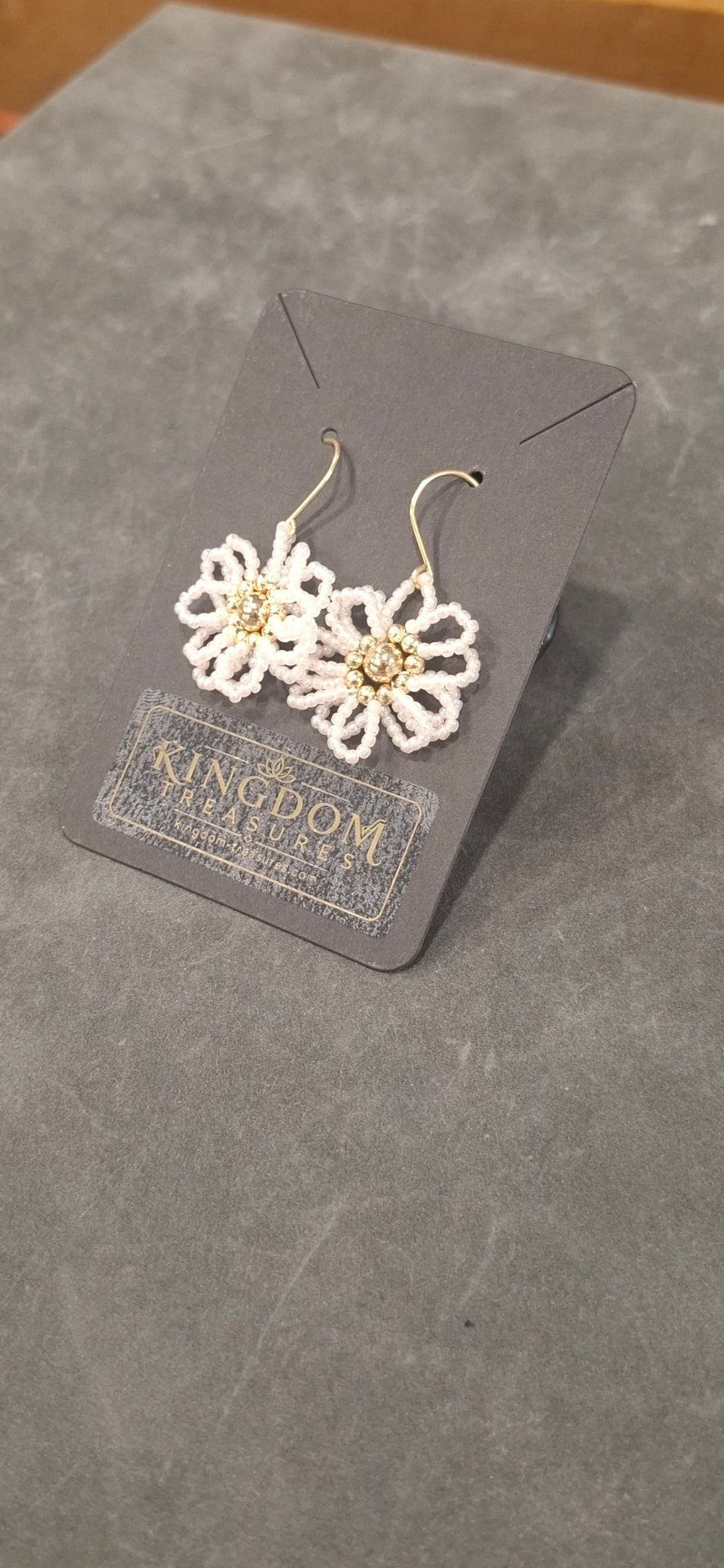 White beaded daisy earrings with gold centres