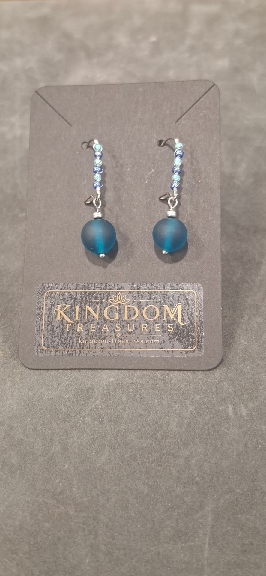 Frosted teal glass drop earrings with blue beadwork